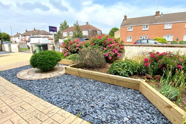 A Beautifully Landscaped Garden With Vibrant Flowe...