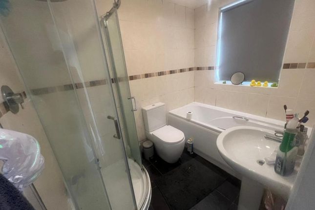 A Spacious And Well-Maintained Bathroom Featuring ...