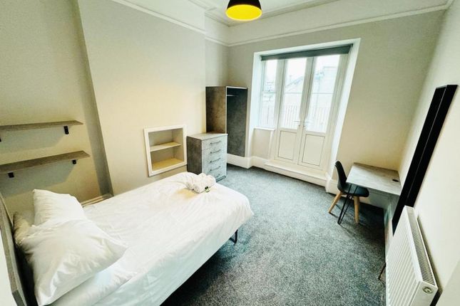 A Bright And Inviting Double Bedroom With Modern d...