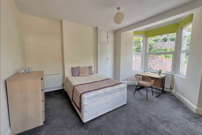 A Spacious And Bright Double Bedroom Featuring Lar...