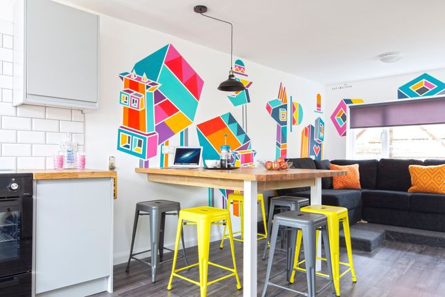 Bright And Modern Kitchen Area Featuring Vibrant A...