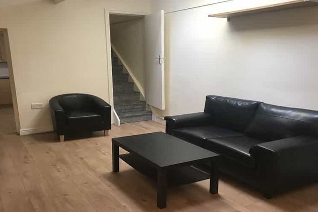 Modern And Spacious Living Room Featuring A Large ...