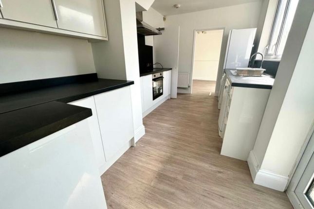 A Modern And Spacious Kitchen With Plenty Of Natur...