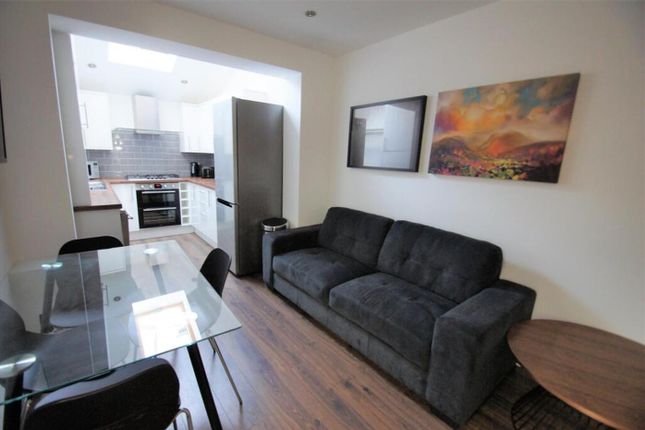 A Stylish Living Room Featuring A Comfortable Sofa...