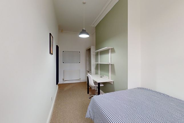 A Spacious And Tidy Double Bedroom Featuring A Stu...
