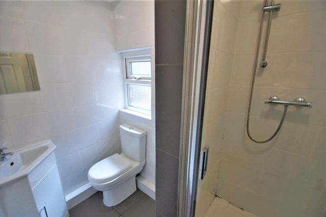 A Bright And Modern Bathroom Featuring A Clean Des...