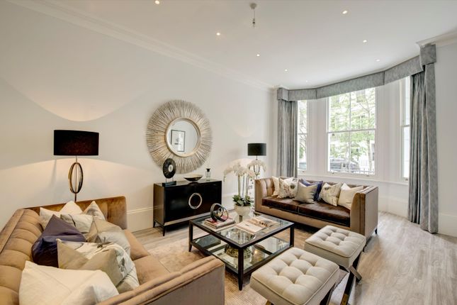Terraced house to rent in Brunswick Gardens, London