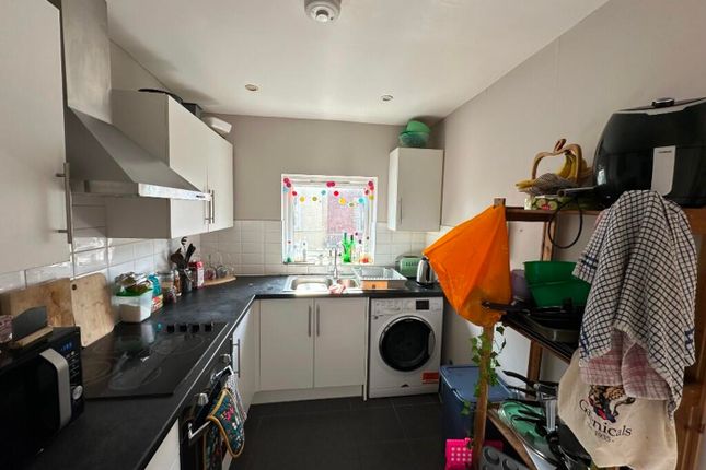 A Bright And Functional Kitchen Featuring Modern A...
