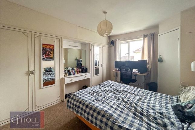 A Spacious And Well-Lit Master Bedroom Featuring A...