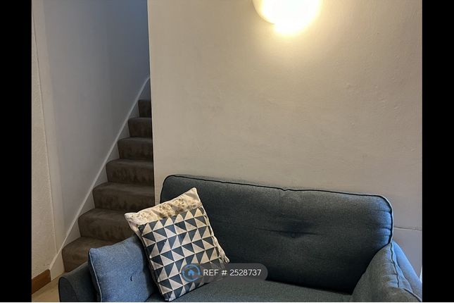 Sofa In Lr &amp; Stairs Leading To Bedrooms