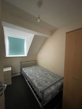 Cozy Double Bedroom Featuring A Comfortable Bed An...