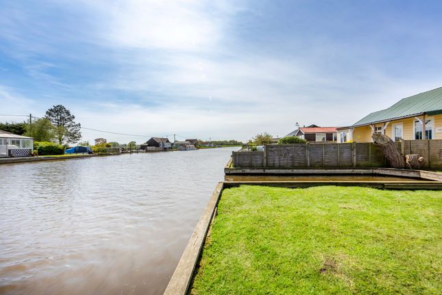 Detached bungalow for sale in North West Riverbank, Potter Heigham, Great Yarmouth