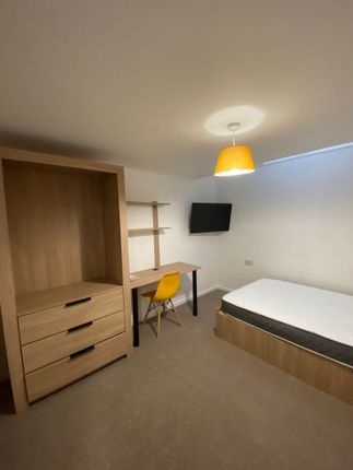 A Cozy Single Bedroom With Natural Light, Featurin...