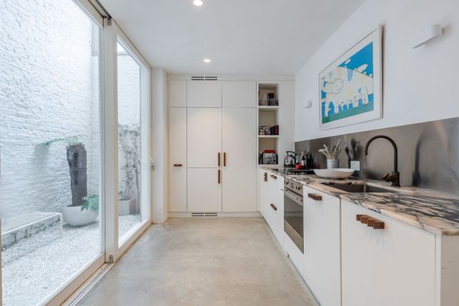 Flat A, 44, Golborne Road, London photo 2