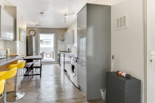 Bright And Modern Living Space Featuring A Comfort...