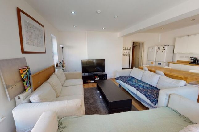 This Inviting Living Room Features A Spacious Layo...