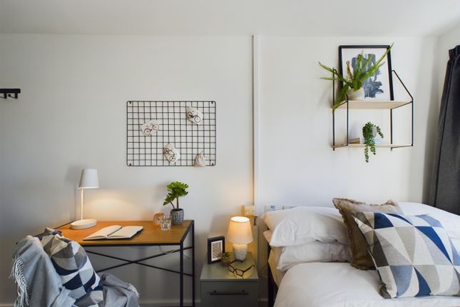 A Stylish And Inviting Double Bedroom With A Cozy ...