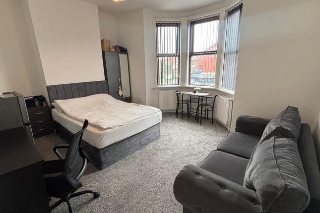 A Spacious And Well-Maintained Master Bedroom Feat...