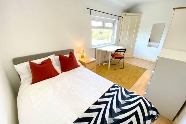 This Charming Double Bedroom Features Ample Natura...