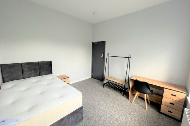 A Spacious And Bright Double Bedroom Featuring Mod...