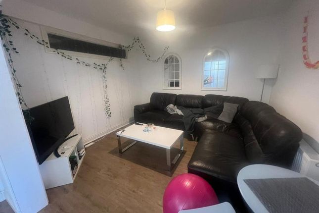 A Cozy Living Room Featuring A Spacious Sectional ...