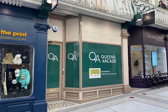 Retail premises to let in Queens Arcade, Leeds