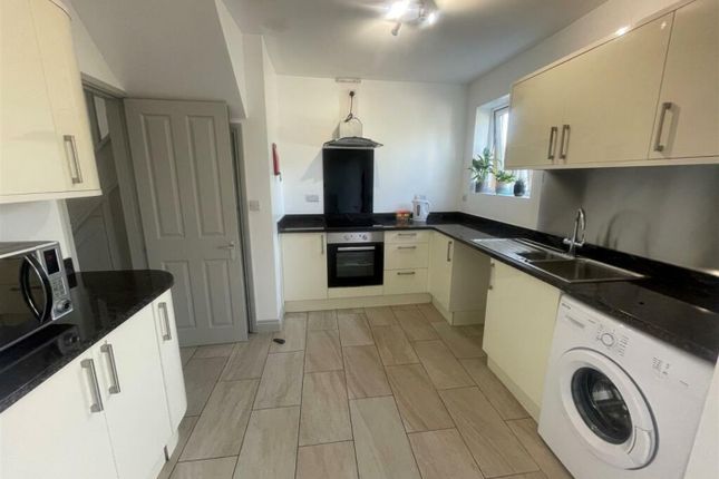 A Clean And Bright Kitchen With Modern Appliances ...