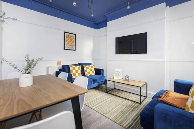 A Spacious And Inviting Modern Living Room, Perfec...