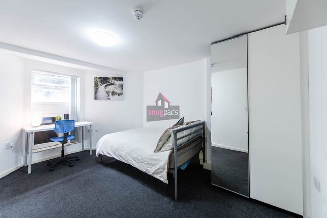 Bright And Tidy Single Bedroom Featuring A Comfort...