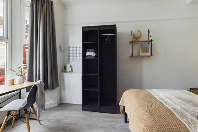 A Bright And Inviting Double Bedroom Featuring Mod...