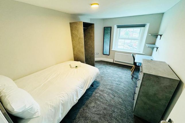 A Bright And Inviting Double Bedroom Featuring Mod...