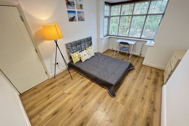 A Bright And Inviting Double Bedroom Featuring A l...