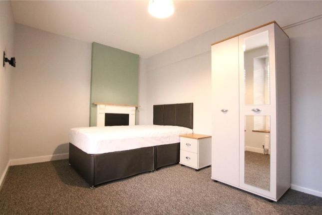 A Spacious And Tidy Double Bedroom Featuring Moder...
