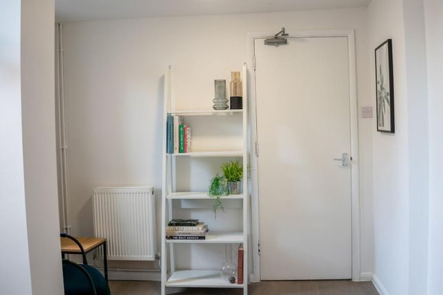 A Bright And Tidy Hallway With Modern Decor And Am...