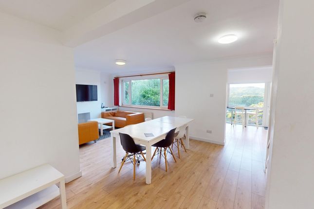 A Spacious And Inviting Large Modern Living Room F...