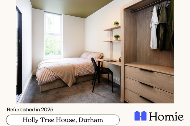 A Bright And Welcoming Master Bedroom Featuring Am...