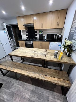 Well-Equipped Kitchen With Contemporary Wooden Cab...