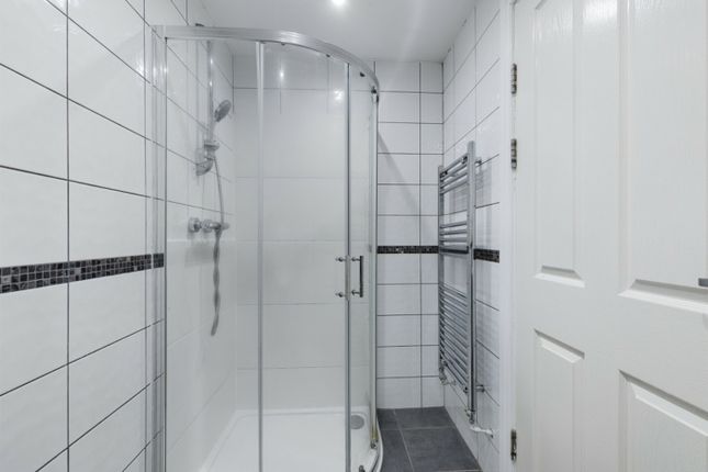 A Modern And Immaculate Bathroom Featuring A Spaci...