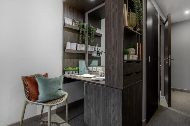 A Modern Communal Workspace Featuring A Neat Desk ...