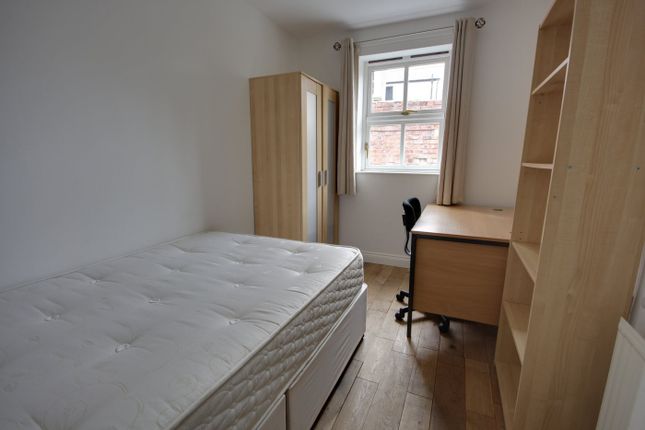 A Bright And Tidy Double Bedroom Featuring A Comfo...