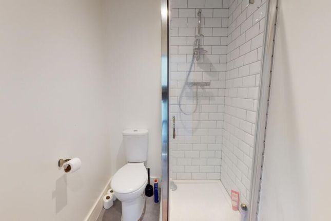 This Modern Bathroom Features A Stylish Shower Wit...