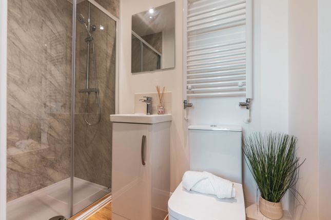 A Modern And Stylish Bathroom With A Refreshing Sh...