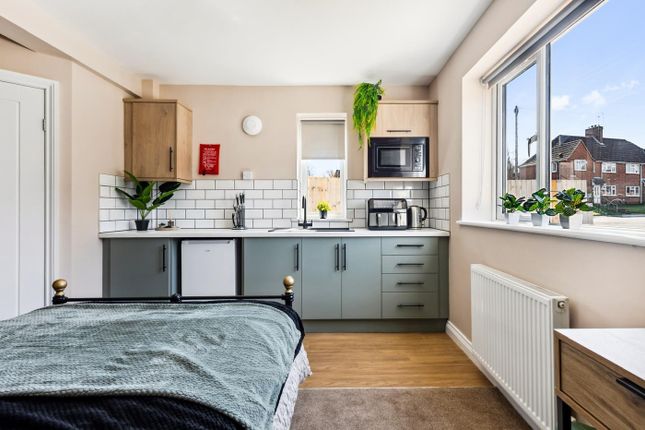 This Cozy Double Bedroom Features A Well-Equipped ...