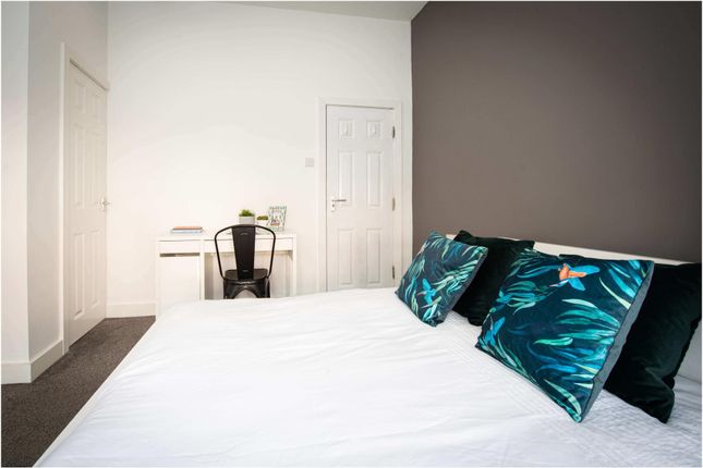 A Modern, Spacious Master Bedroom Featuring Large ...