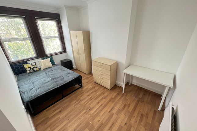 A Bright And Tidy Double Bedroom Featuring Large W...