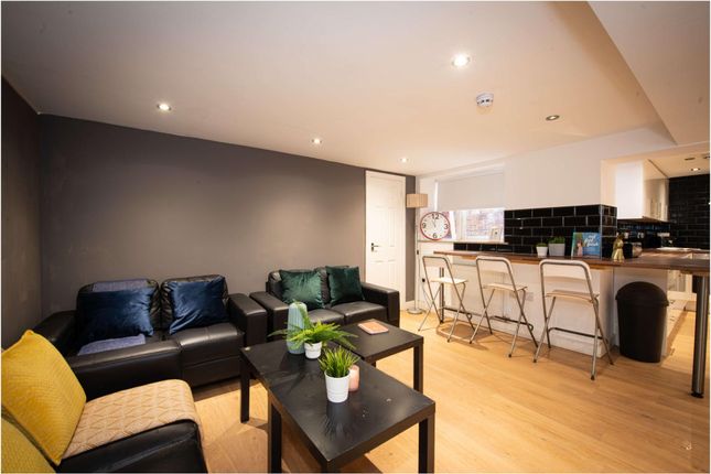 A Modern, Well-Maintained Living Room With Comfort...