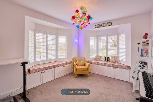 Smaller Lounge/ Kids Room/ Dining Room
