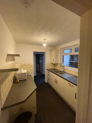 A Functional Kitchenette Featuring Ample Storage A...