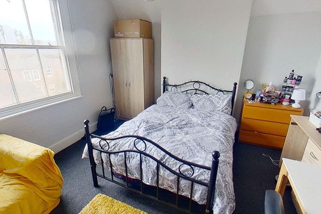 This Charming Double Bedroom Features A Comfortabl...