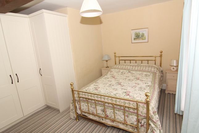 Terraced house for sale in High Street, Llangadog, Carmarthenshire.